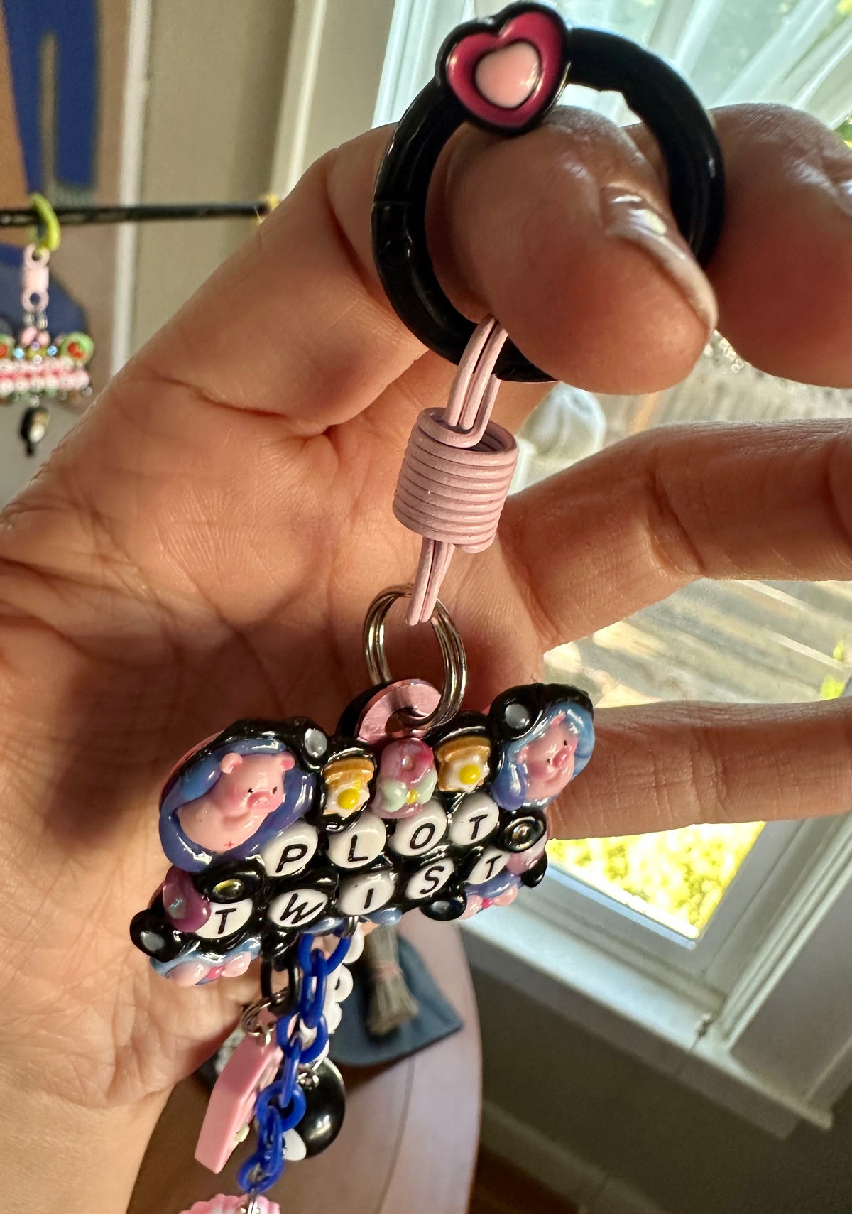 Handmade one-of-a-kind Plot Twist Pocket Pal bag charm by Drea Svea