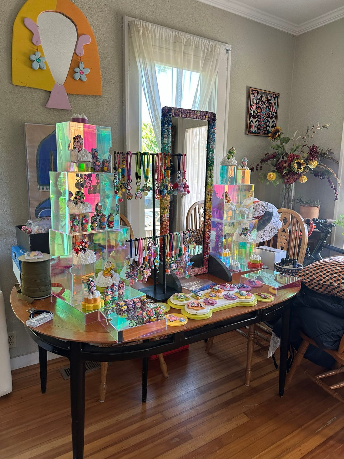 Drea Svea rainbow booth display being tested at home before Oregon Country Fair