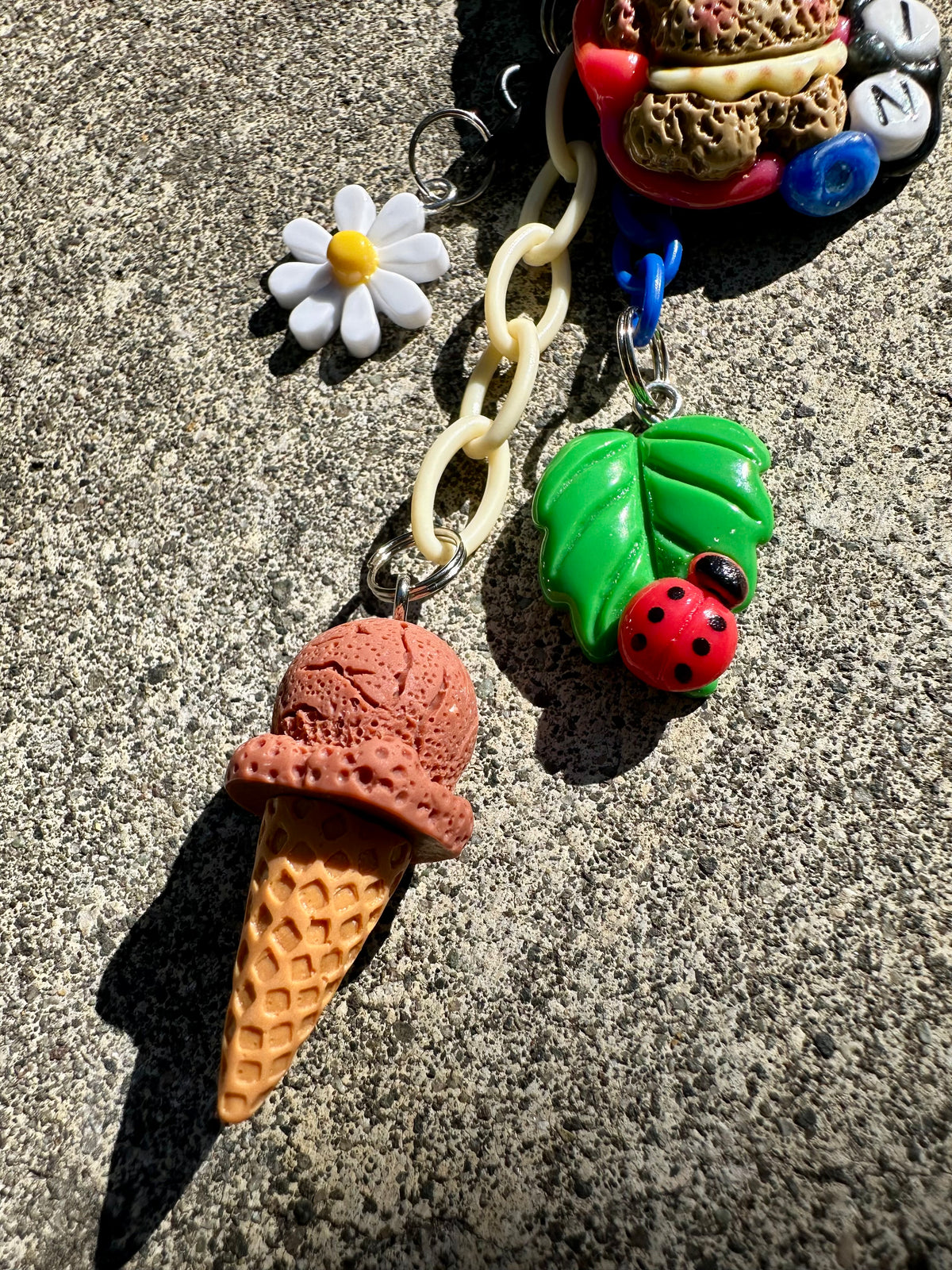 Handmade one-of-a-kind Crumb from Planet BARK Pocket Pal bag charm by Drea Svea