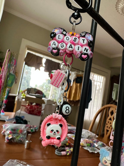 Handmade one-of-a-kind Lost Again Pocket Pal bag charm by Drea Svea