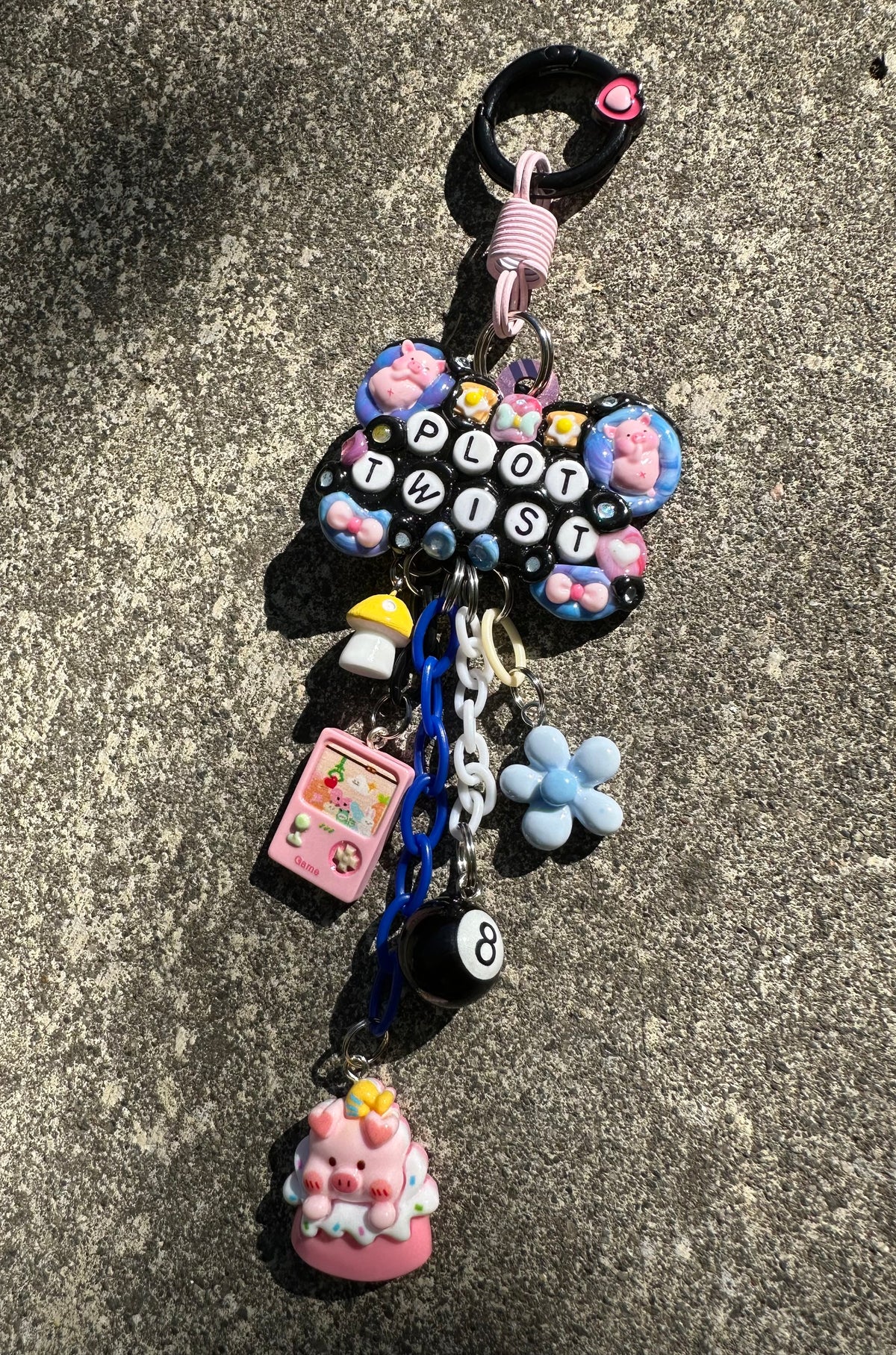 Handmade one-of-a-kind Plot Twist Pocket Pal bag charm by Drea Svea