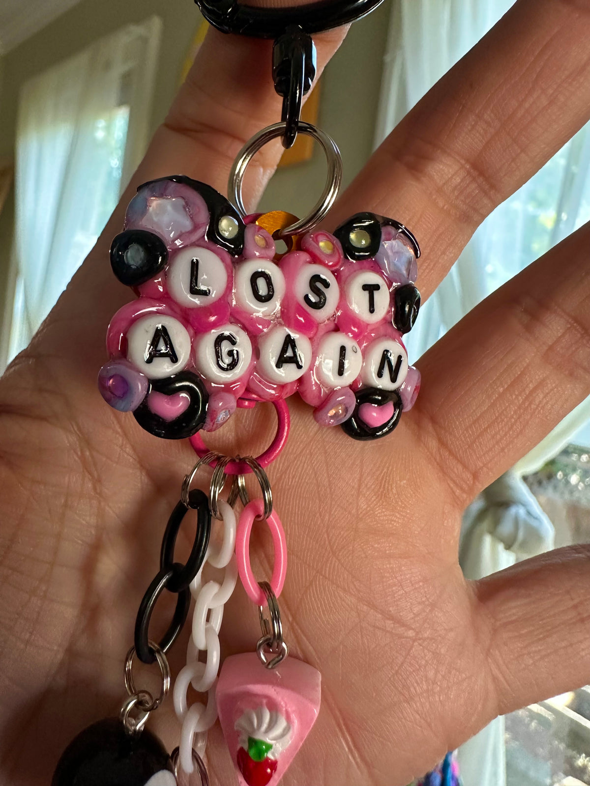 Handmade one-of-a-kind Lost Again Pocket Pal bag charm by Drea Svea