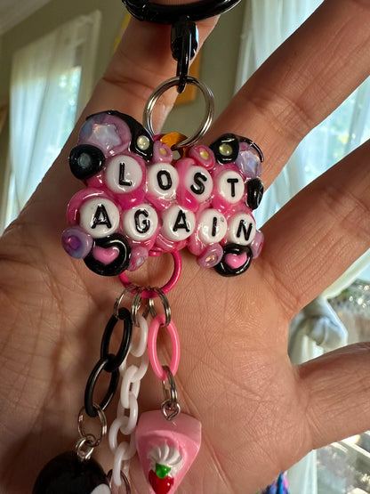 Handmade one-of-a-kind Lost Again Pocket Pal bag charm by Drea Svea