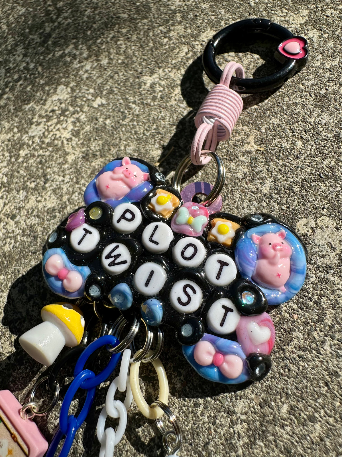 Handmade one-of-a-kind Plot Twist Pocket Pal bag charm by Drea Svea