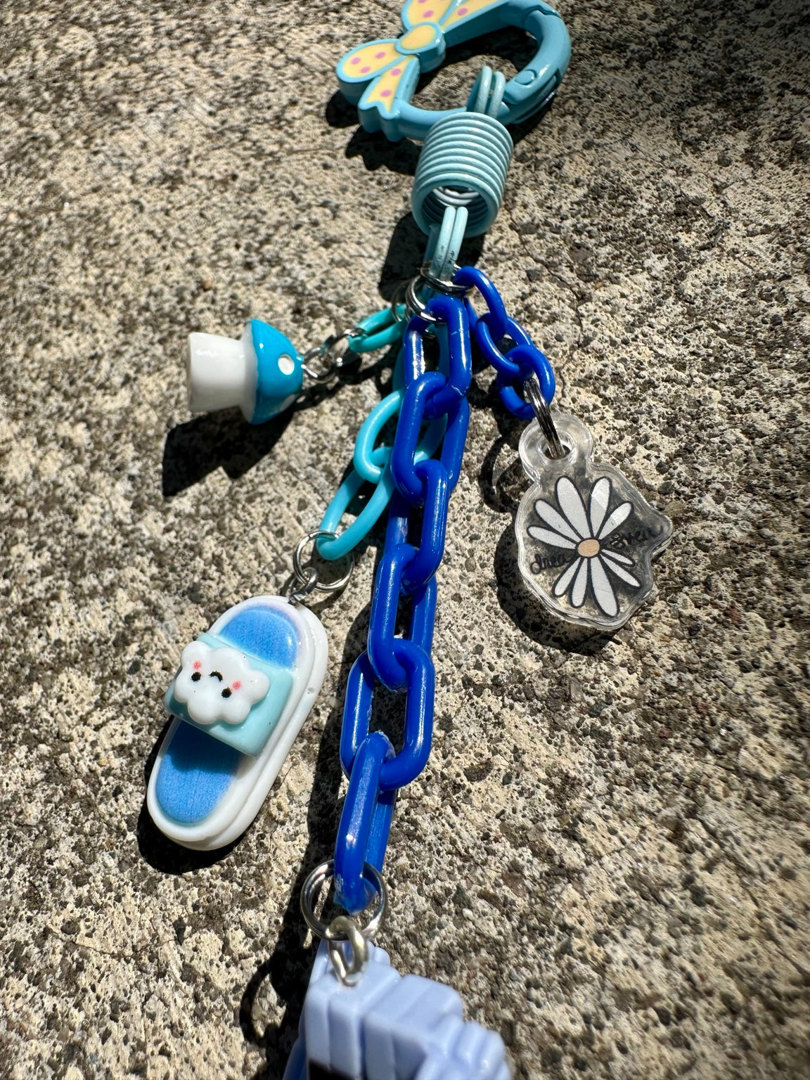 Blue robot Pocket Pal charm detail
