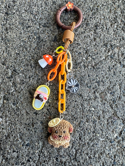 Crumb Planet BARK Pocket Pal bag charm hanging upright, full view
