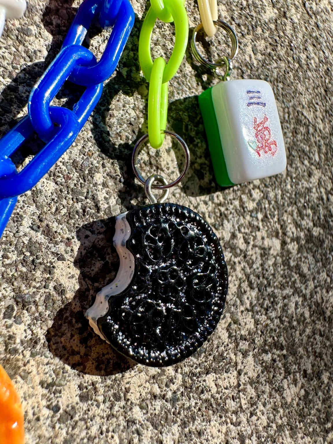 Booked and Busy Pocket Pal cookie and mahjong charm detail