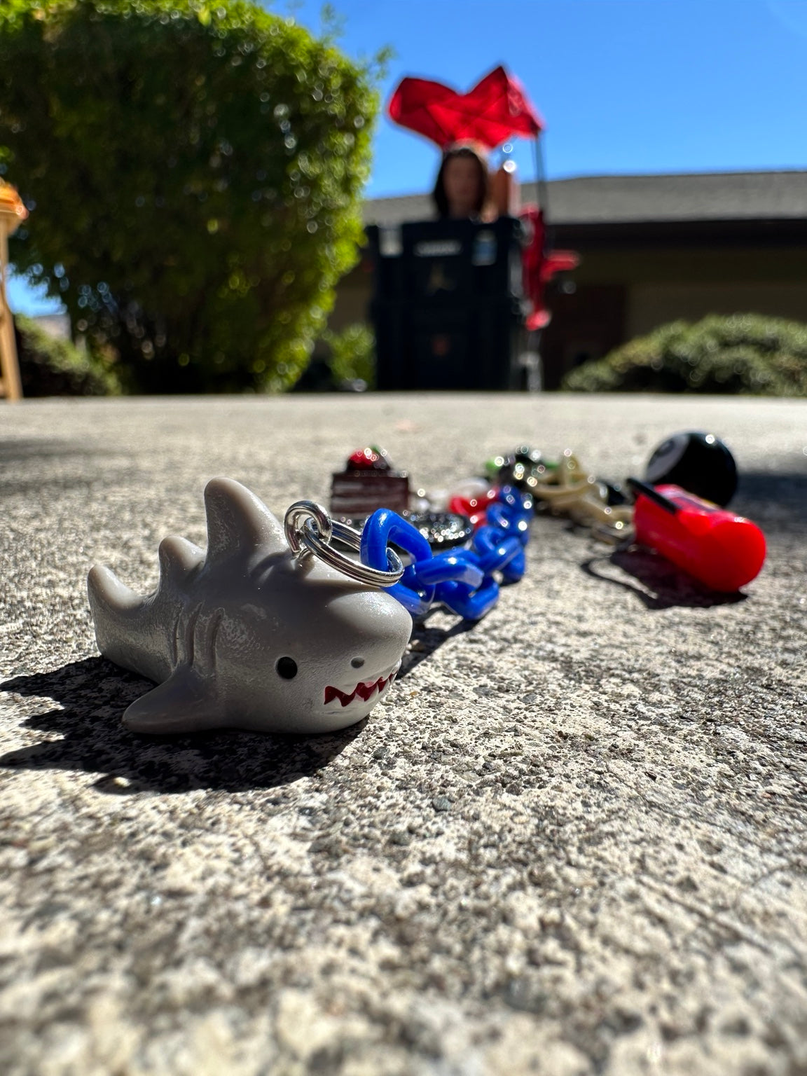 Emergency Snack Pocket Pal shark charm close-up