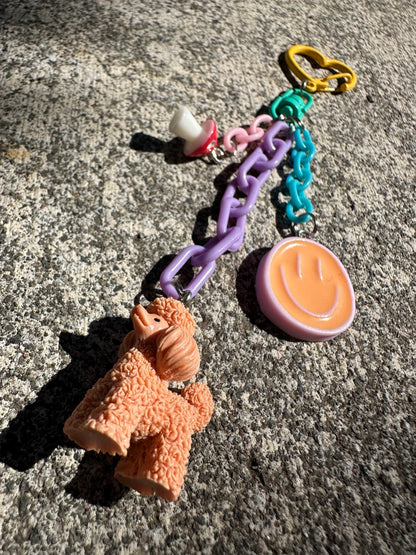 Just Happy Pocket Pal bag charm close-up