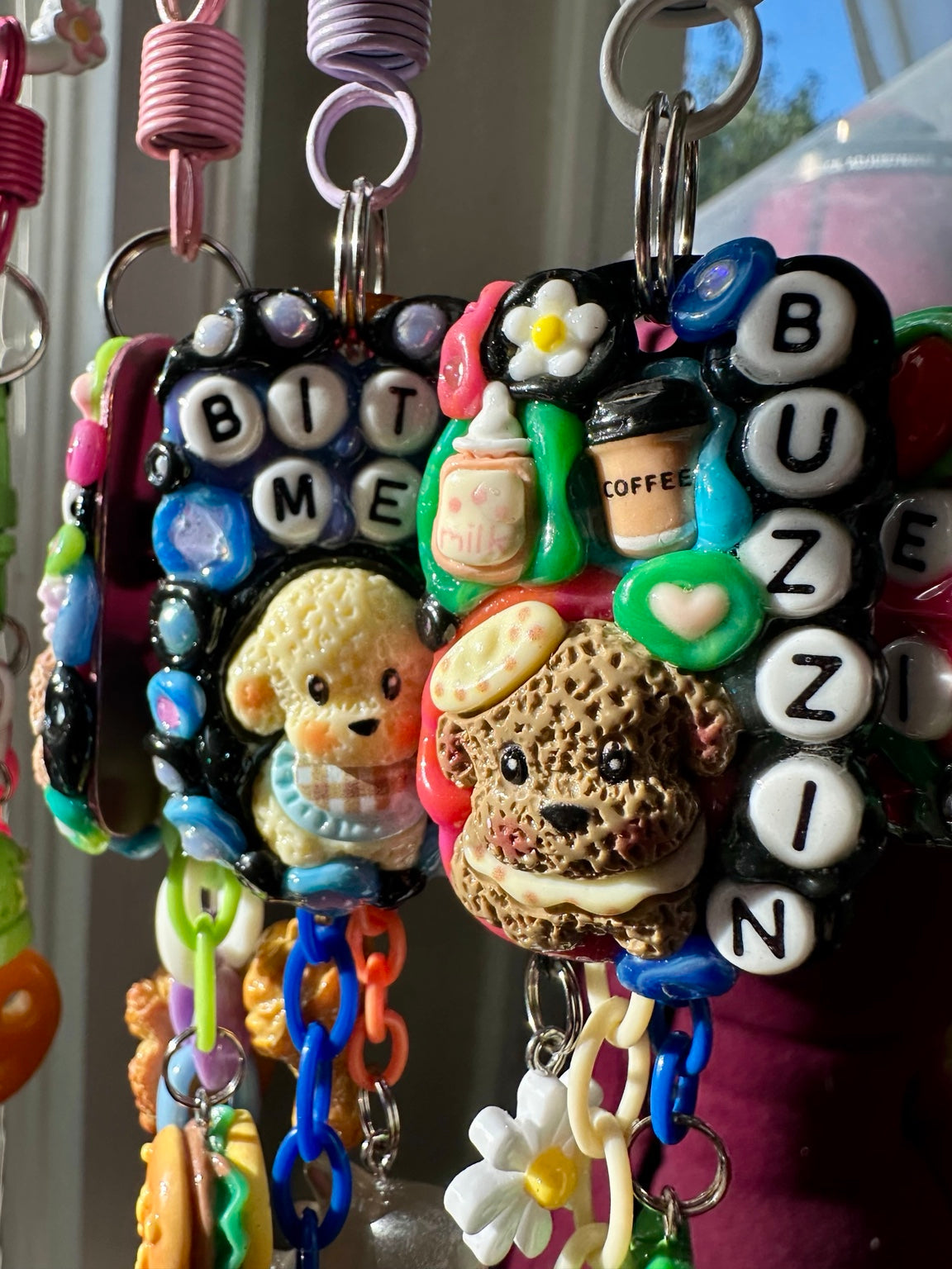 Handmade Pocket Pals with colorful word beads and miniature character charms